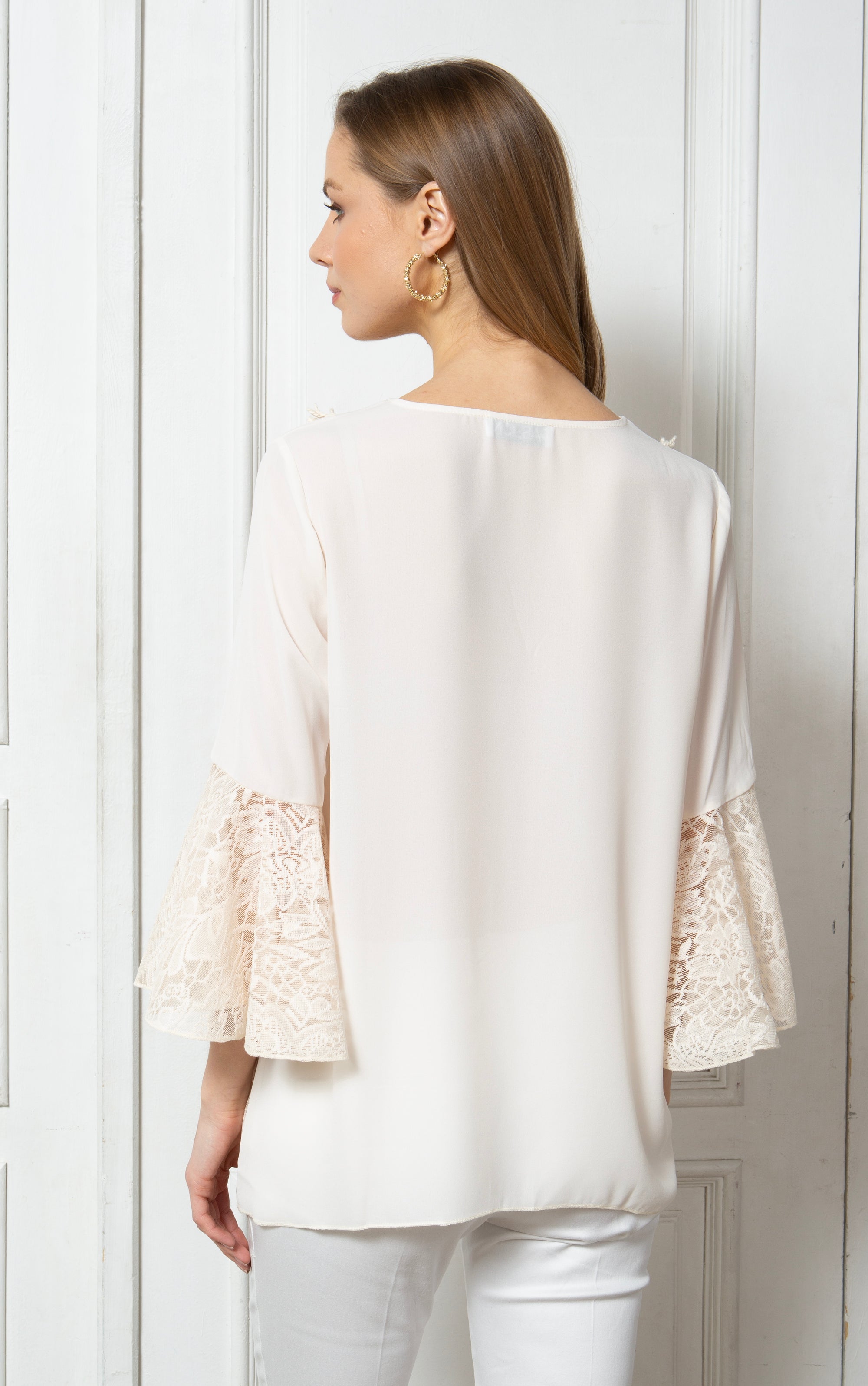 Tunika mit goldenen Details und Spitze