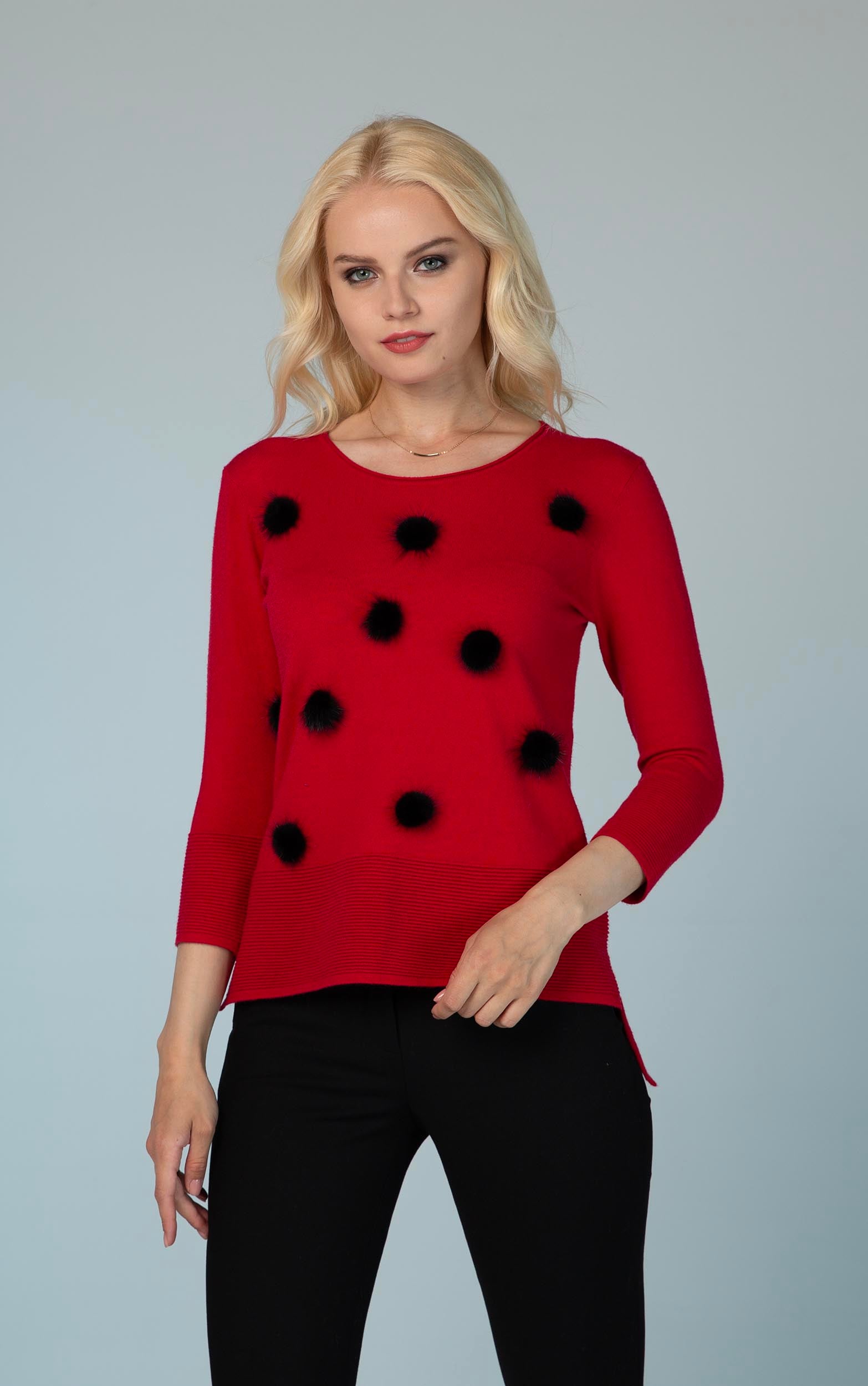 Strickpullover mit schwarzen Bommeldetails