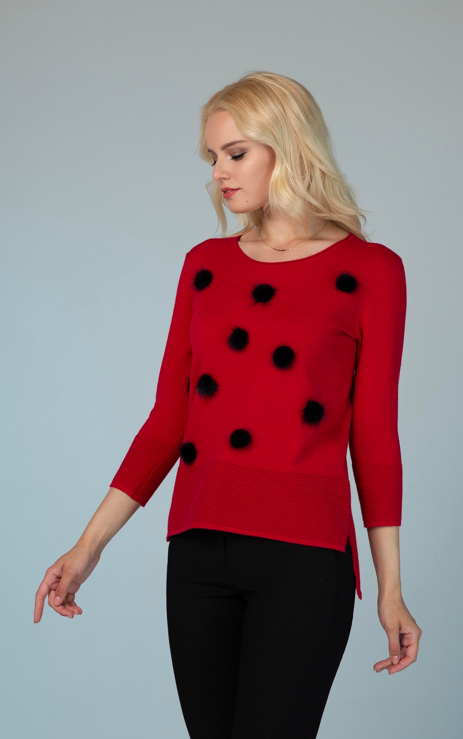 Strickpullover mit schwarzen Bommeldetails