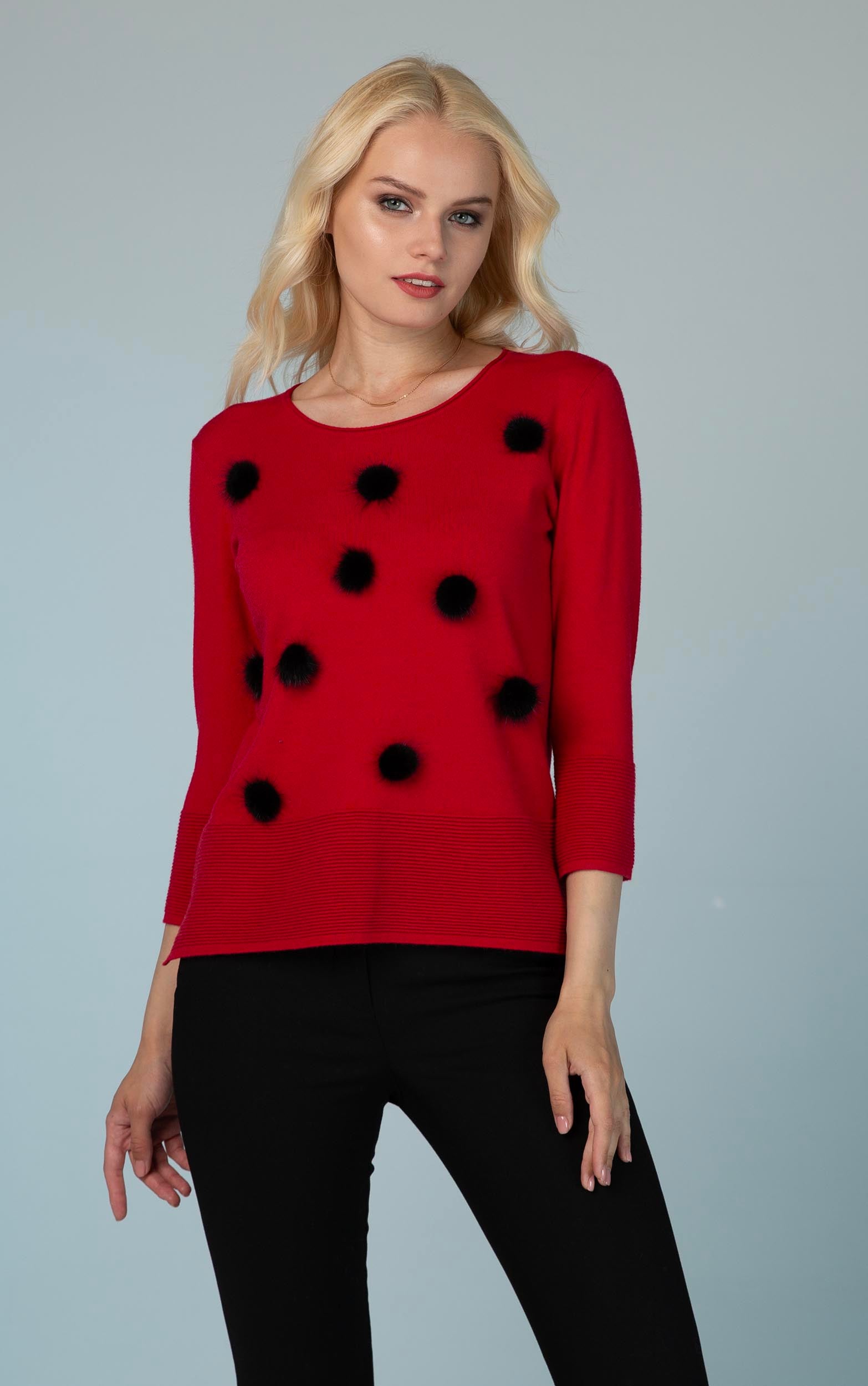 Strickpullover mit schwarzen Bommeldetails